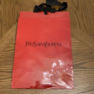 Yves Saint Laurent paper bag.